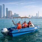 Self drive boat experience in Abu Dhabi with tourists enjoying a private ride on turquoise waters
