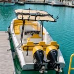 Small yellow fishing boat rental in Abu Dhabi with 8 pax capacity