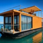 Premium floating villa rental in Abu Dhabi offering a luxury stay with marina views and rooftop relaxation deck.