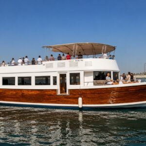 Ocean Majesty luxury party boat in Abu Dhabi with spacious outdoor deck and elegant wooden exterior.