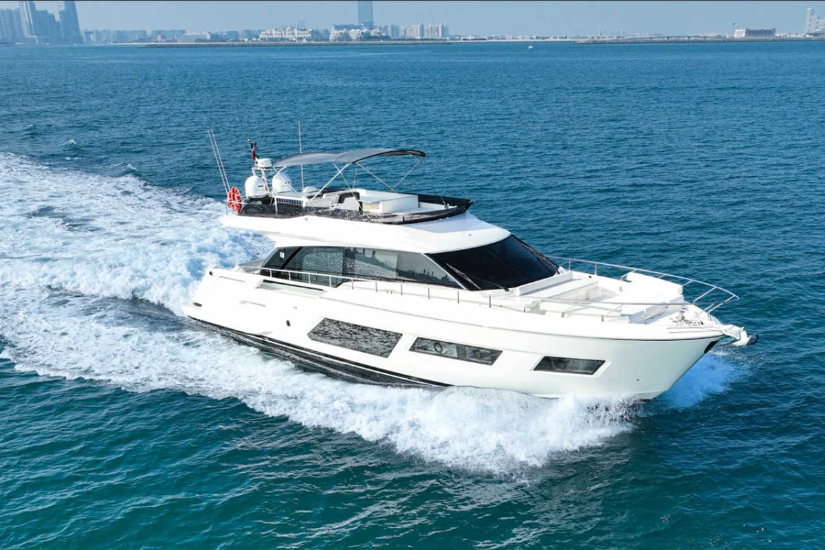 Ferretti 670 F1 trackside yacht charter berthed at a prime trackside VIP sector inside Yas Marina.
