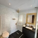 Amber Regent yacht rental bathroom with glass rain shower, Yas Marina, Abu Dhabi