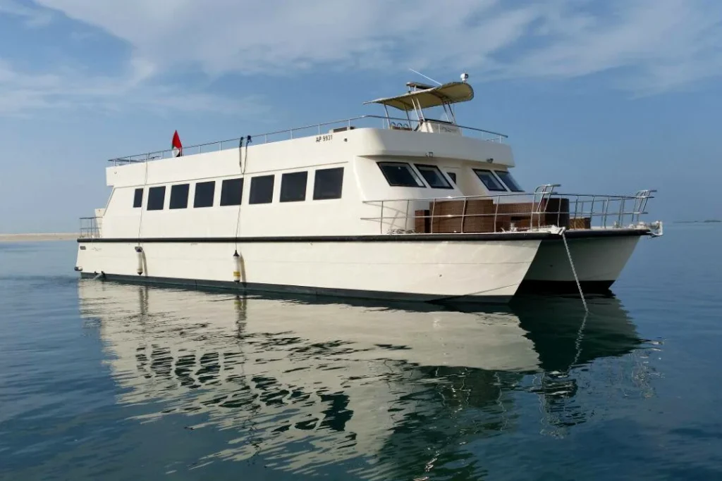 Butinah Boat Abu Dhabi – 75 ft catamaran at anchor