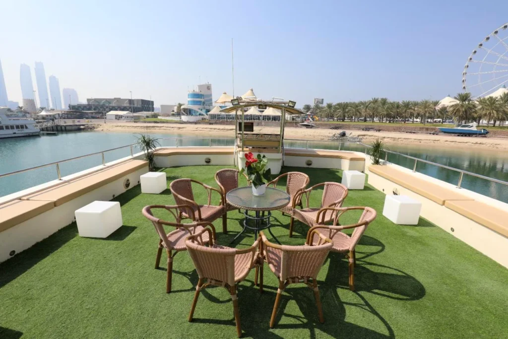 Butinah Boat rooftop deck with lounge seating, Abu Dhabi