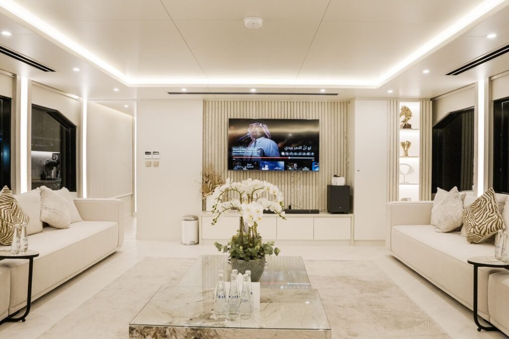 Celestia yacht rental white air-conditioned main salon, Yas Marina, Abu Dhabi