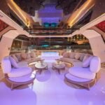 Celestia yacht rental upper lounge with starry ceiling and mood lighting, Yas Marina, Abu Dhabi