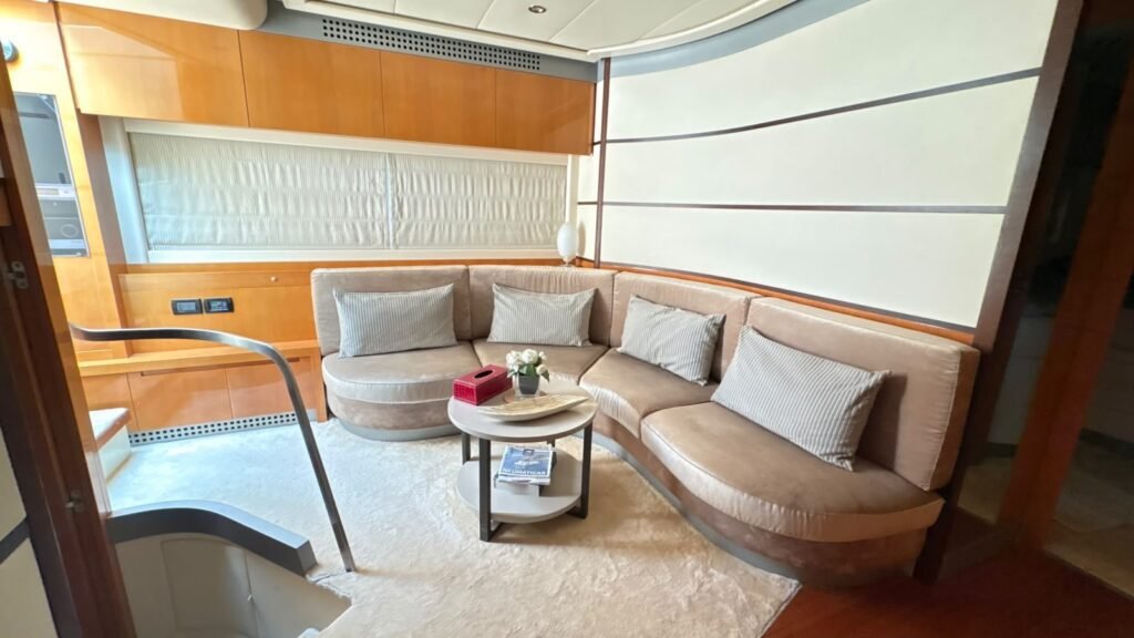 Pershing 62 lower lounge with wood finishes