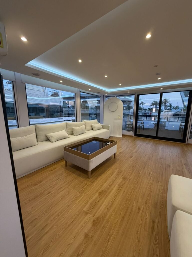 Serenity Haven houseboat – lounge with panoramic windows, Al Qana, Abu Dhabi