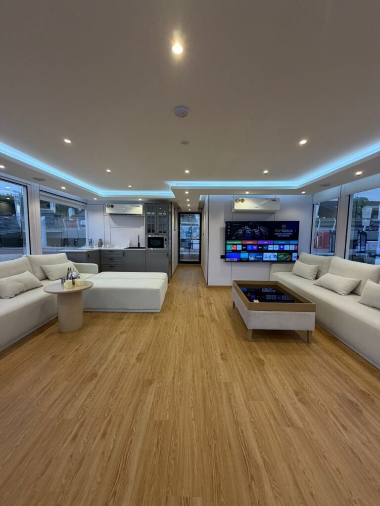Serenity Haven houseboat – air-conditioned salon with sofas and TV, Al Qana, Abu Dhabi