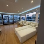 Serenity Haven houseboat – white sofa corner by the windows, Al Qana, Abu Dhabi