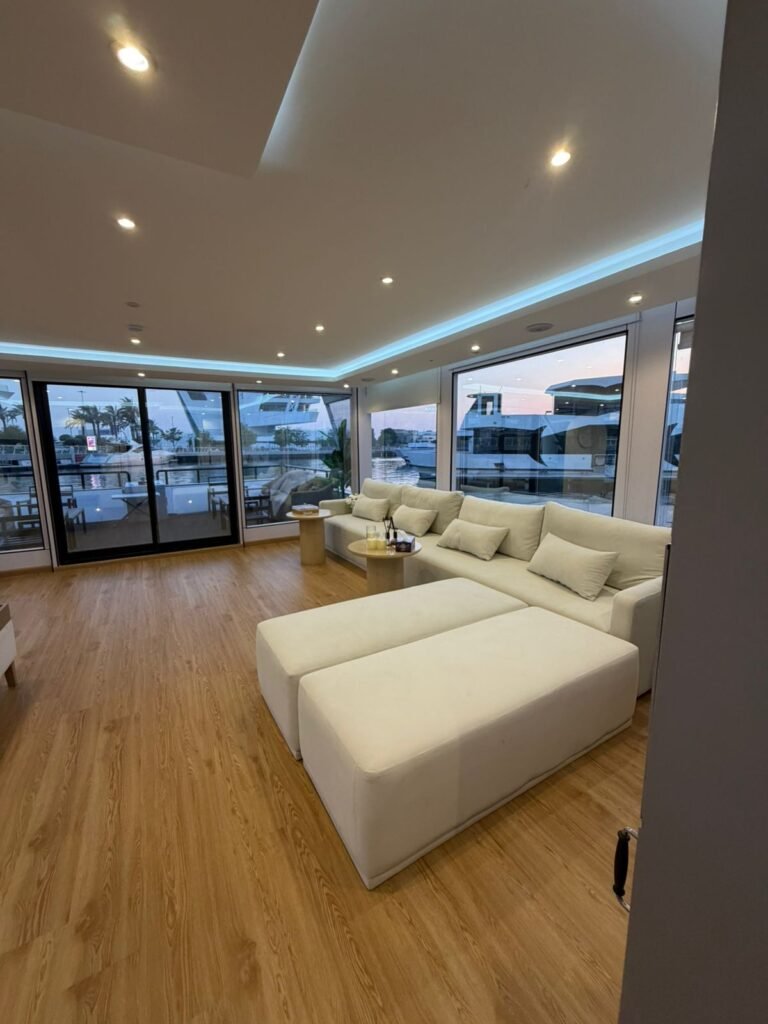 Serenity Haven houseboat – white sofa corner by the windows, Al Qana, Abu Dhabi